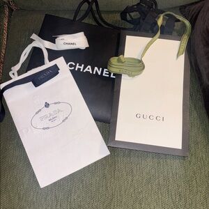 Gucci, Prada, Chanel ribbon and bags